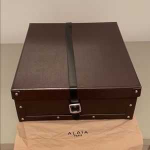 Alaia boot box with leather strap